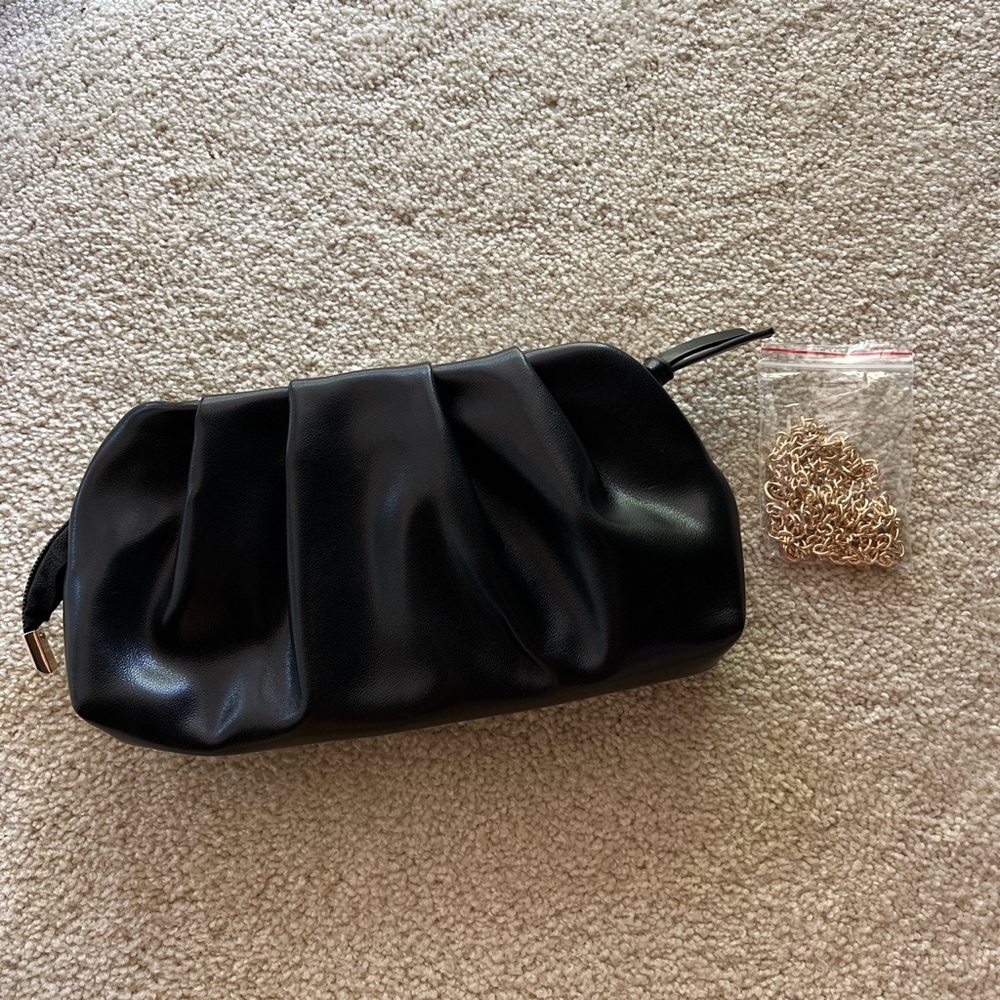 Little black clutch with gold chain
